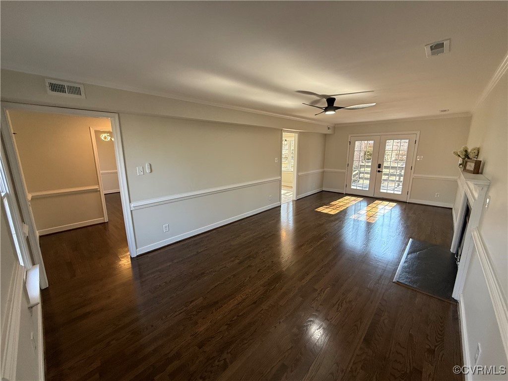 13911 Turtle Hill Road Midlothian, VA 23112 - Photo 3 of 26 an empty room with wooden floor and windows