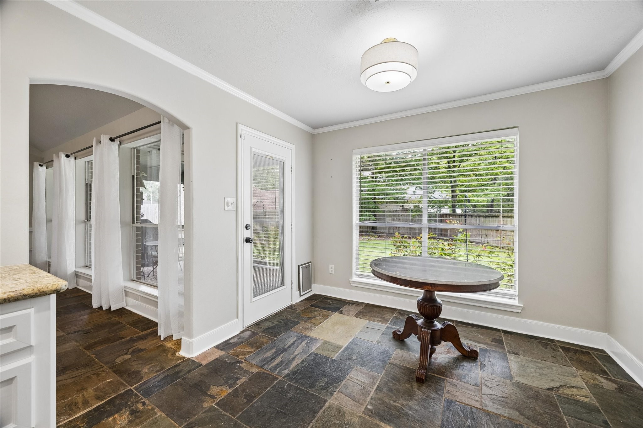 109 Dawns Edge Conroe, TX 77356 - Photo 8 of 24 a view of a livingroom with wooden floor and a lounge chair