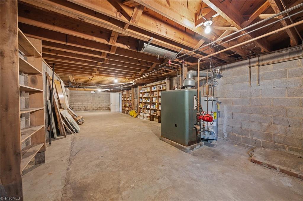 502 West Hunter Street Madison, NC 27025 - Photo 27 of 41 Workshop, unfinished basement