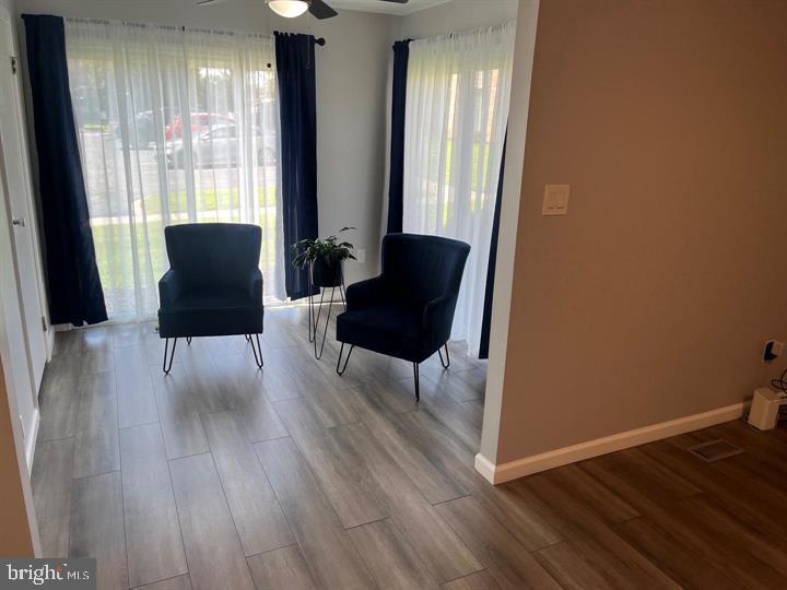 11 Kent Place Sewell, NJ 08080 - Photo 4 of 17 a view of a livingroom with furniture and wooden floor
