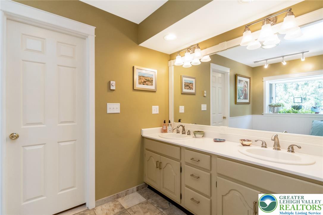 1553 Surrey Road Bethlehem, PA 18015 - Photo 40 of 92 Double vanity with ample counter space and storage offers both style and functionality in this well-appointed bathroom.