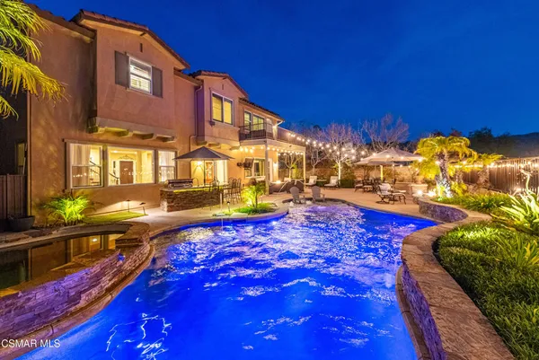 a view of a street with a building in the background