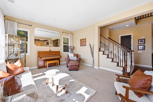a room with furniture and a flat screen tv