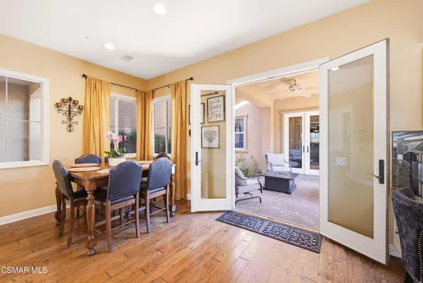 a bath tub sitting in a bathroom next to a window