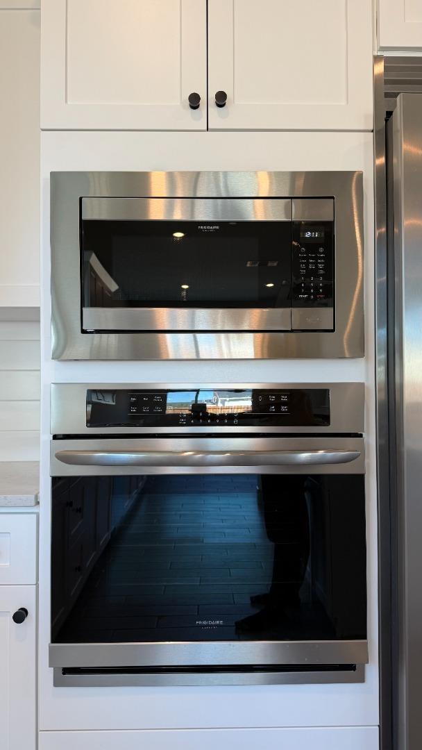 2475 Bastidas Drive Merced, CA 95340 - Photo 22 of 59 a stove top oven sitting inside of a kitchen