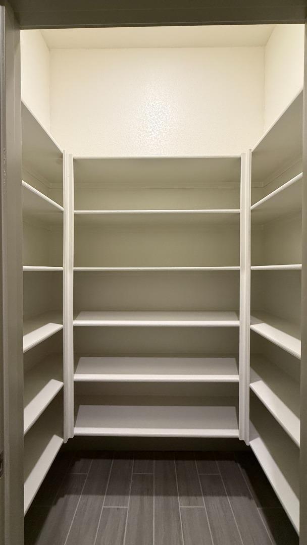 2475 Bastidas Drive Merced, CA 95340 - Photo 26 of 59 a view of walk in closet with empty racks