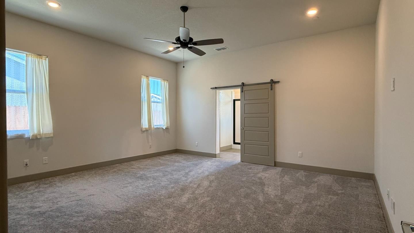 2475 Bastidas Drive Merced, CA 95340 - Photo 27 of 59 a view of an empty room with a window