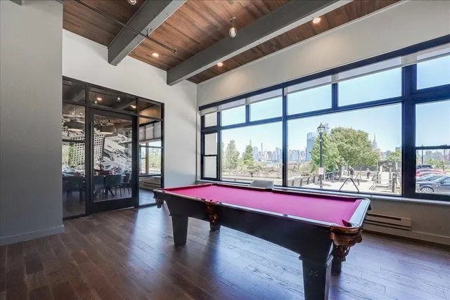 a room with furniture and wooden floor