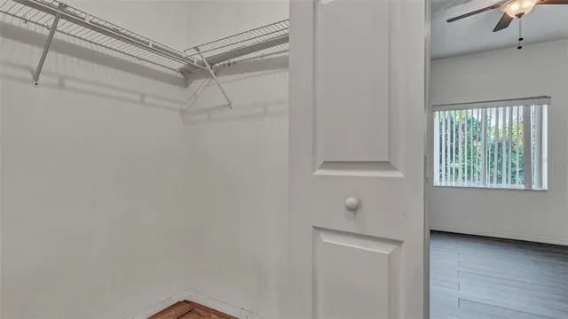 a view of a hallway with closet