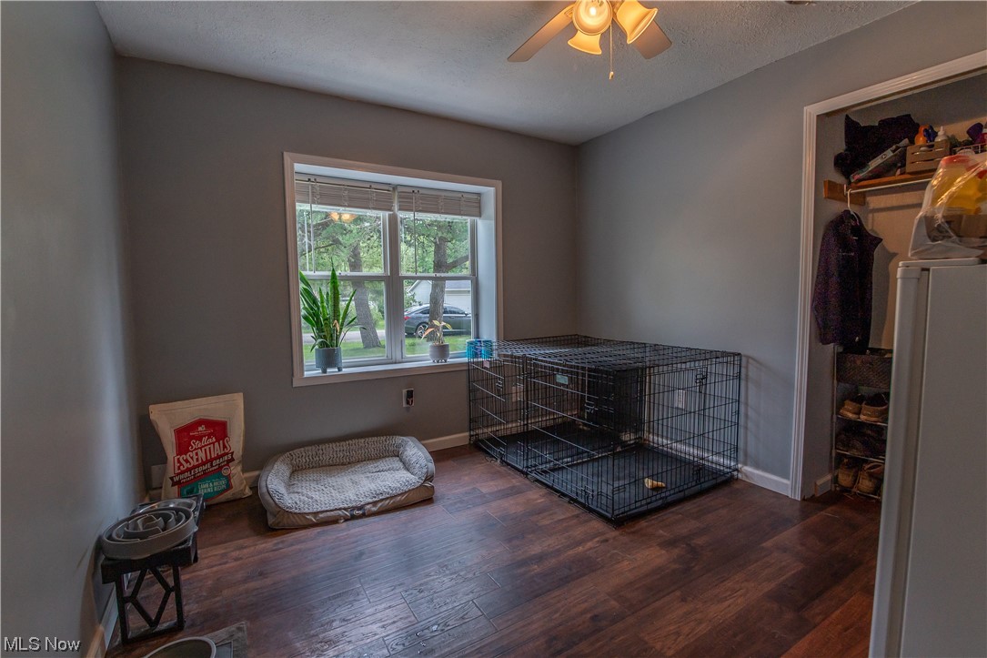 4168 Beckley Road Stow, OH 44224 - Photo 14 of 19 Misc room with dark hardwood floors and ceiling fan