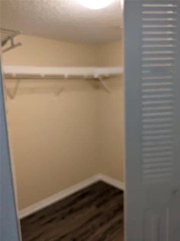 a view of small space with racks on the wall