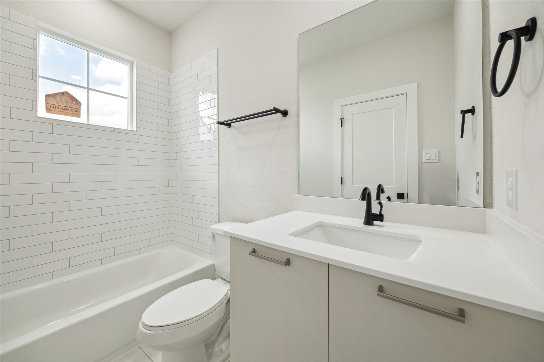 3911 Tulane Street, Unit B Houston, TX 77018 - Photo 27 of 37 Bright and modern third-floor bathroom featuring sleek fixtures and a stylish, tiled shower.