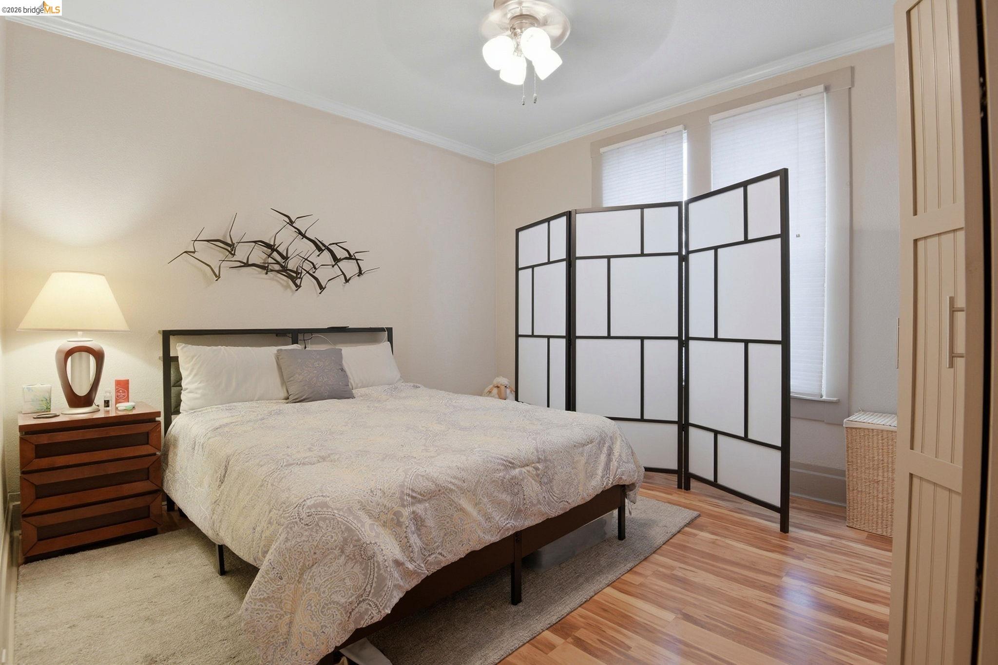 2155 Chestnut Street Livermore, CA 94551 - Photo 12 of 44 Bedroom featuring ornamental molding, light wood-style flooring, and a ceiling fan