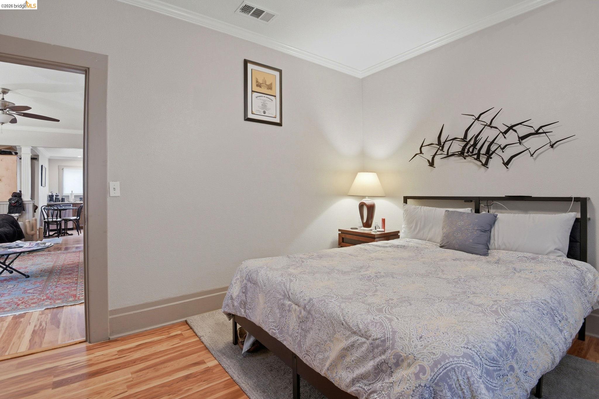 2155 Chestnut Street Livermore, CA 94551 - Photo 13 of 44 Bedroom featuring ornamental molding and light wood-style floors
