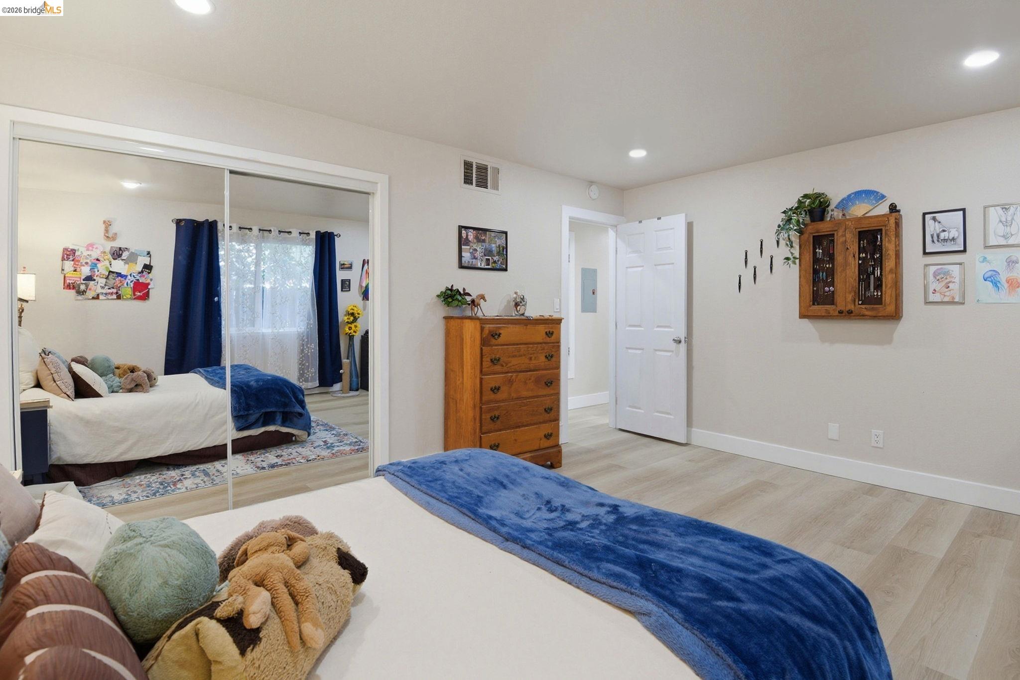 2155 Chestnut Street Livermore, CA 94551 - Photo 24 of 44 Bedroom with light wood-style floors, recessed lighting, and a closet
