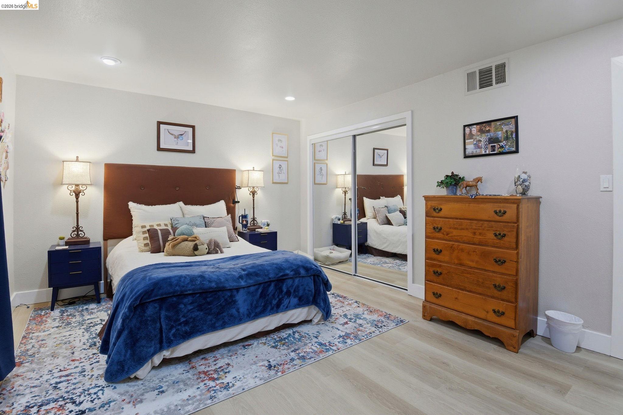 2155 Chestnut Street Livermore, CA 94551 - Photo 26 of 44 Bedroom with light wood-style floors and a closet