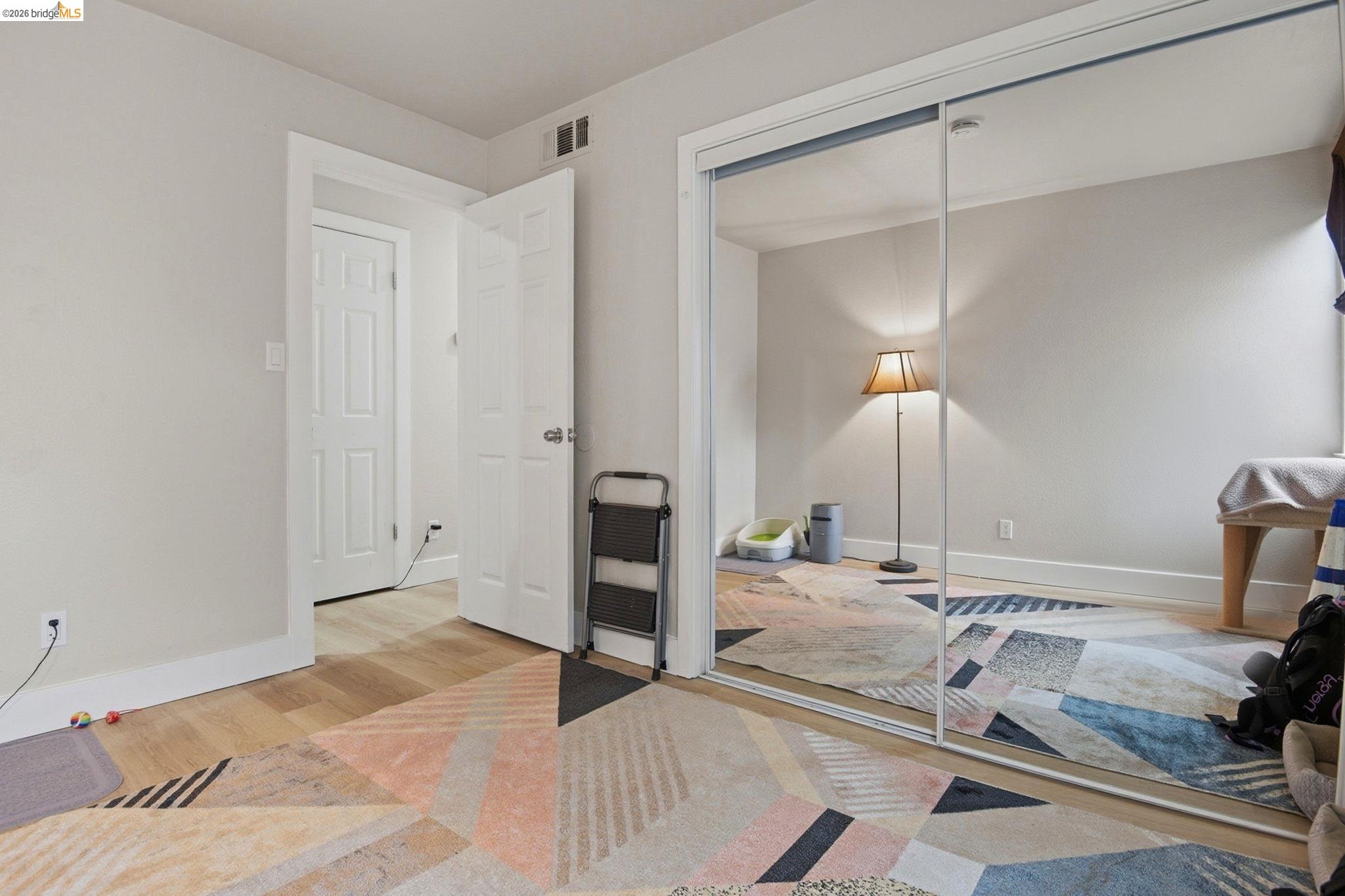 2155 Chestnut Street Livermore, CA 94551 - Photo 29 of 44 Bedroom with light wood-style floors and a closet