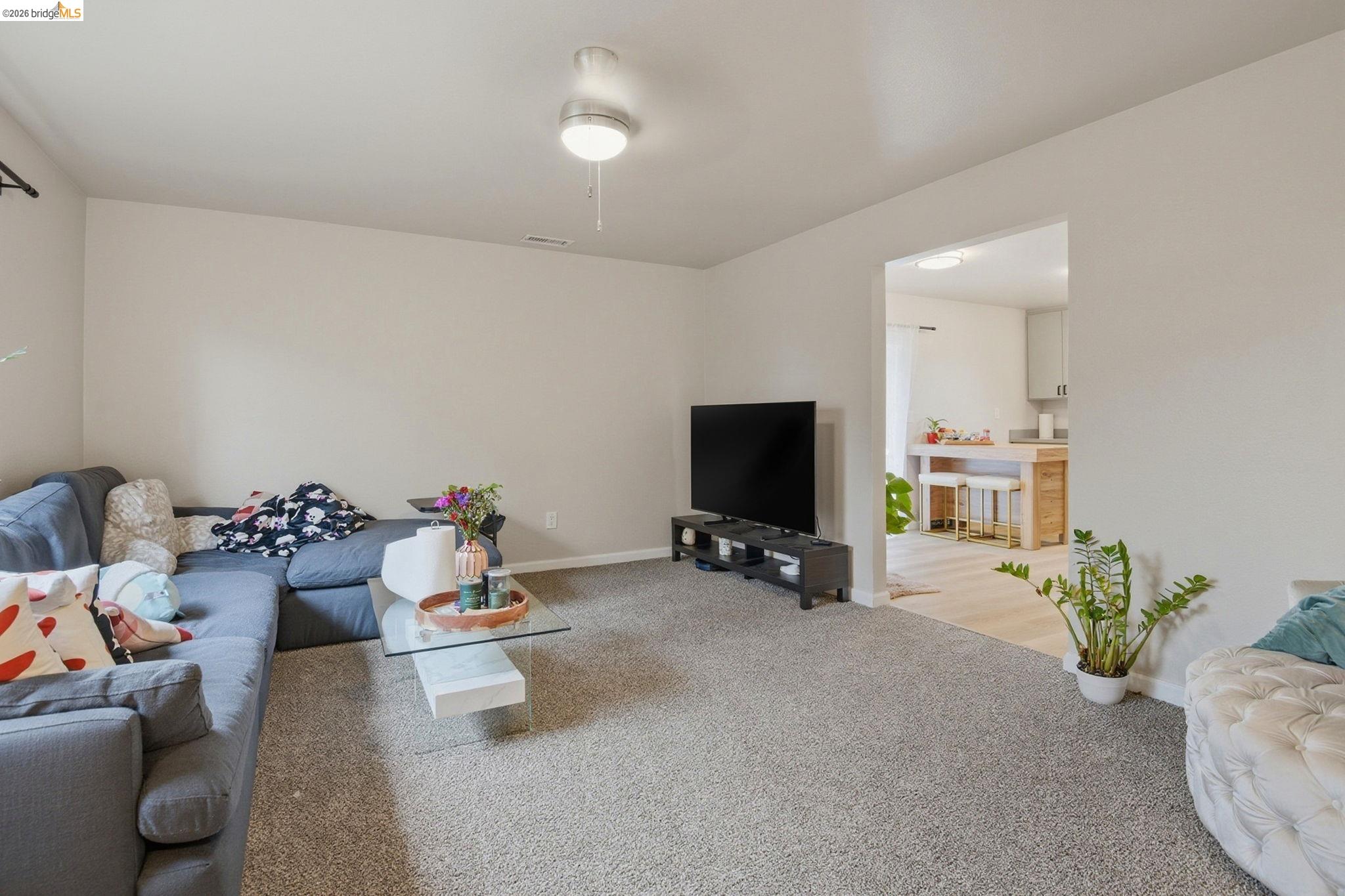 2155 Chestnut Street Livermore, CA 94551 - Photo 31 of 44 Living room with baseboards and carpet floors