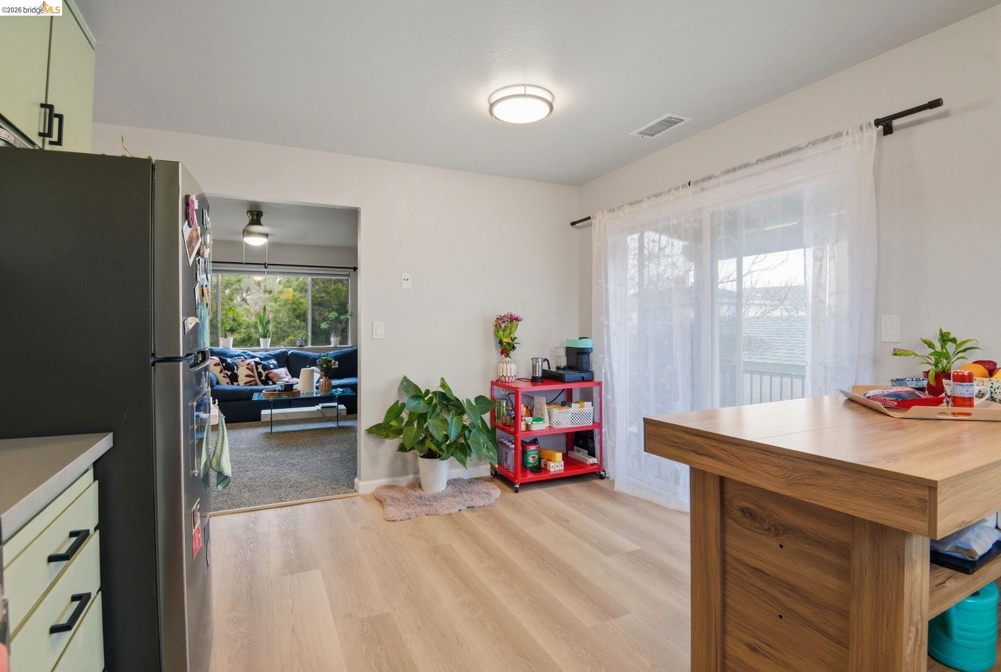 2155 Chestnut Street Livermore, CA 94551 - Photo 36 of 44 Kitchen featuring freestanding refrigerator, light wood-style floors, and light countertops