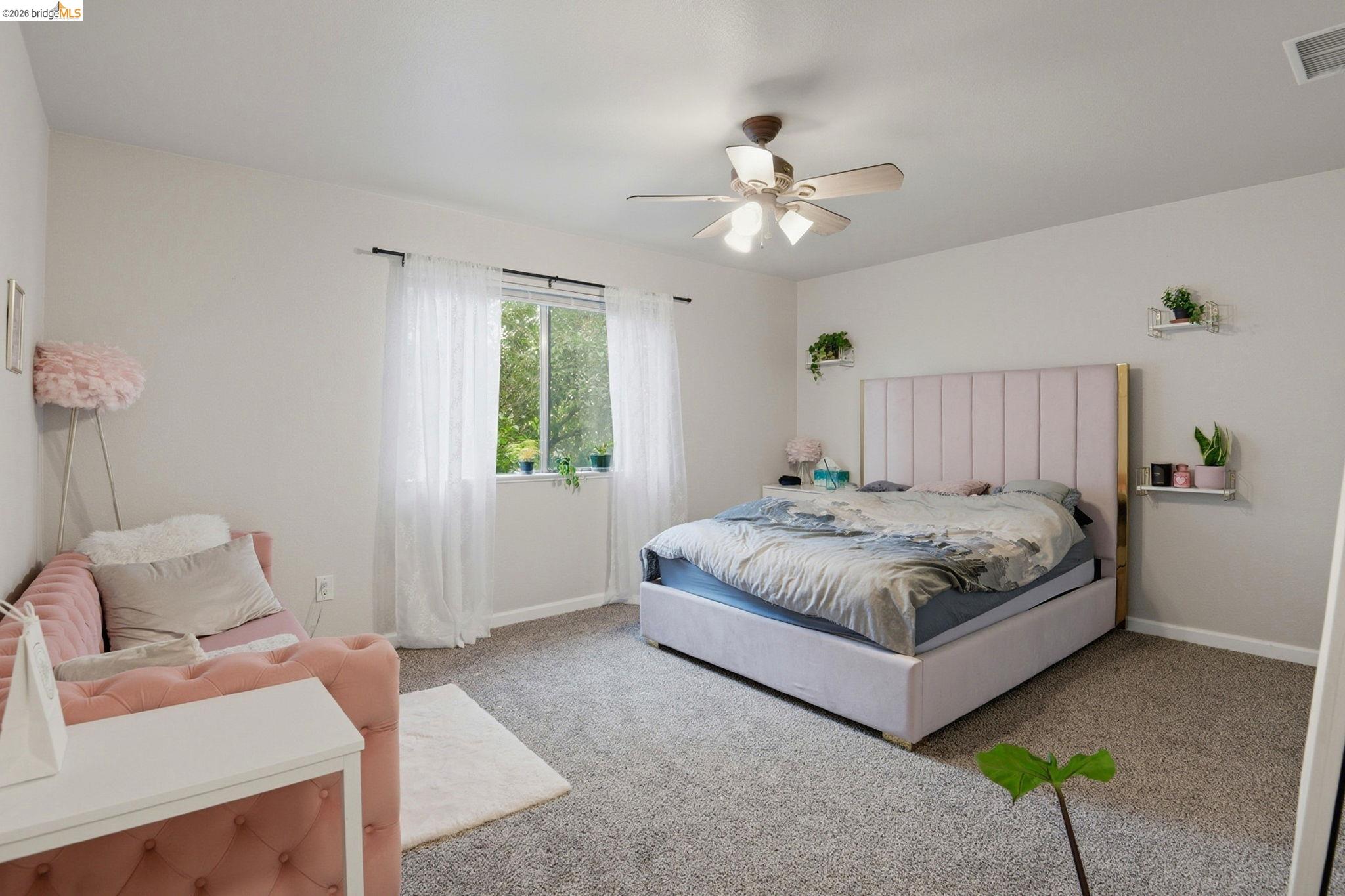 2155 Chestnut Street Livermore, CA 94551 - Photo 39 of 44 Carpeted bedroom with ceiling fan and baseboards