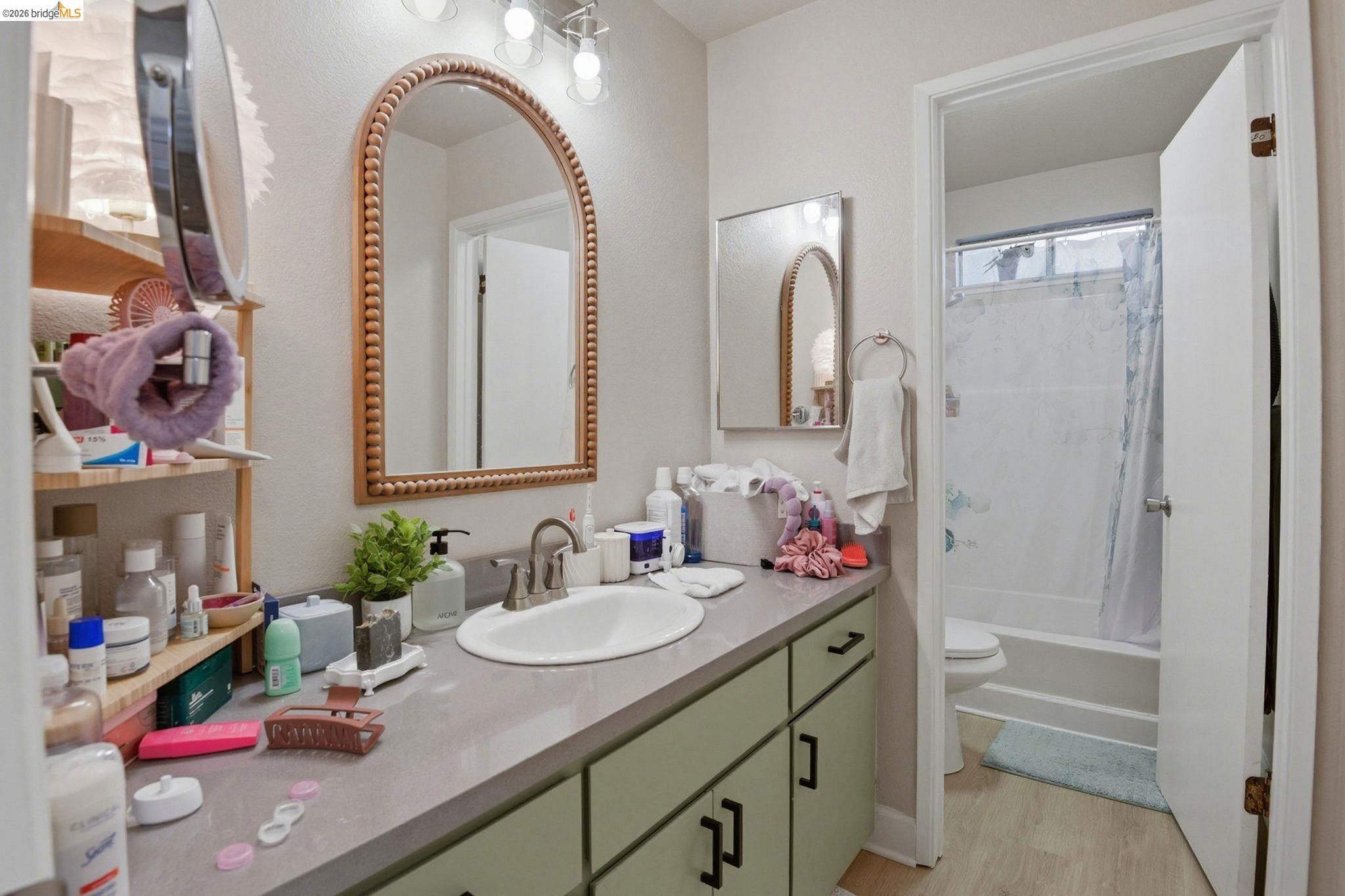 2155 Chestnut Street Livermore, CA 94551 - Photo 44 of 44 Full bath with vanity, shower / tub combo, and light wood-style floors