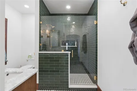 a bathroom with a sink and mirror