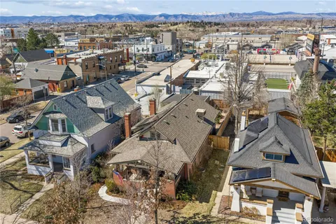 an aerial view of a city with lots of residential buildings