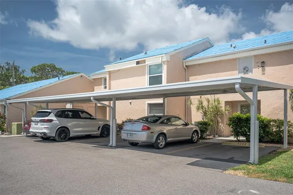 a view of a cars parked in front of a building