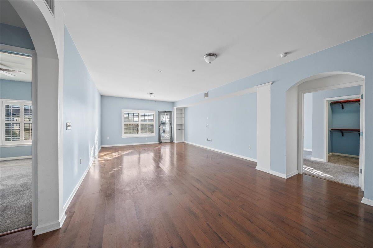 665 Tennessee Street, Unit 301 Memphis, TN 38103 - Photo 15 of 38 wooden floor in an empty room with a window