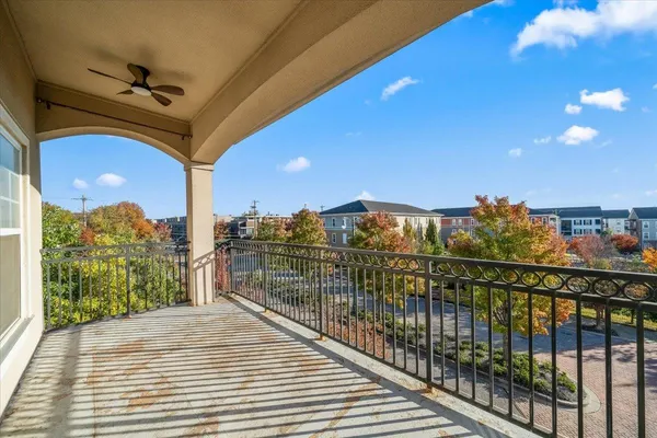 a view of a balcony with city view