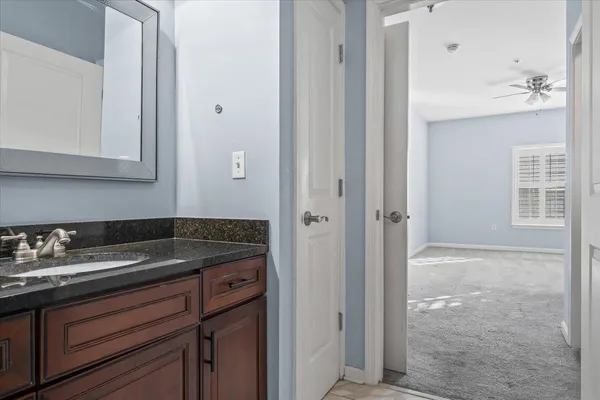 a view of cabinets and window