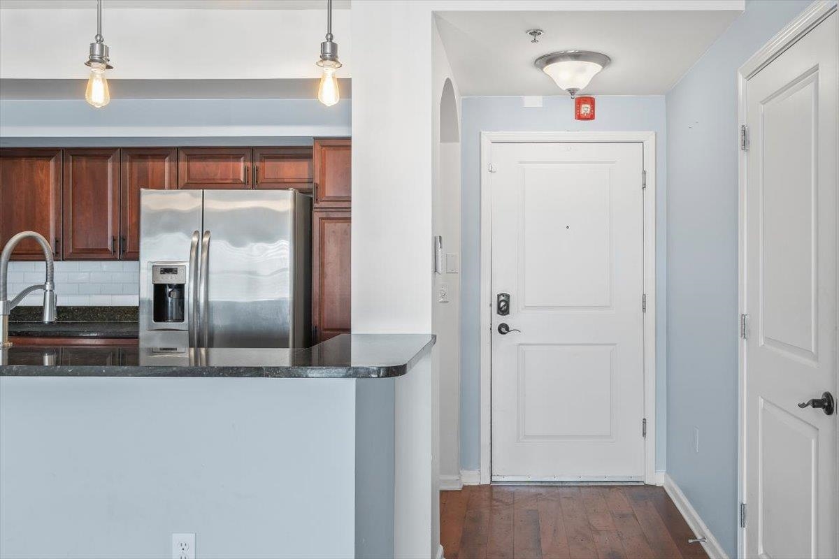 665 Tennessee Street, Unit 301 Memphis, TN 38103 - Photo 8 of 38 a view of a kitchen with a fridge