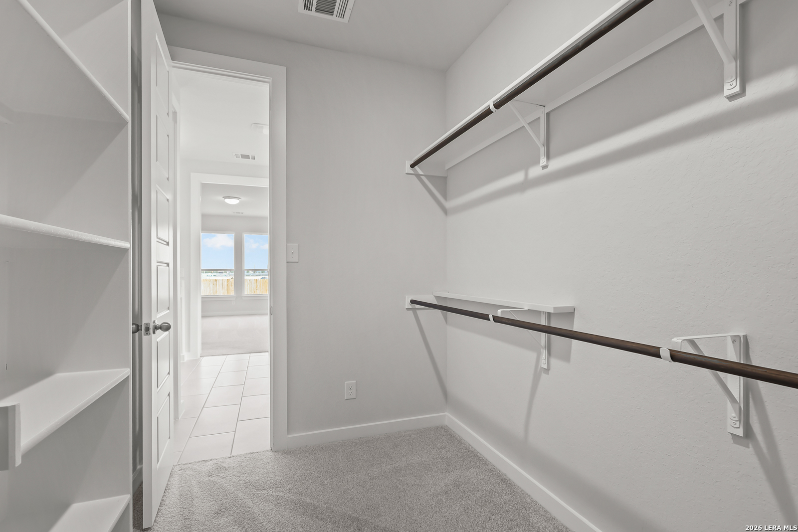 165 Mallorys Way Castroville, TX 78009 - Photo 23 of 34 a view of walk in closet