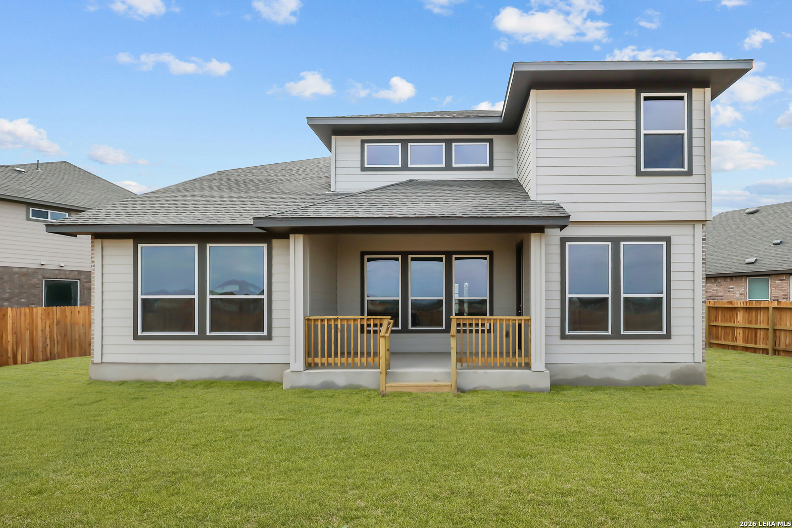 165 Mallorys Way Castroville, TX 78009 - Photo 28 of 34 a front view of a house with a garden