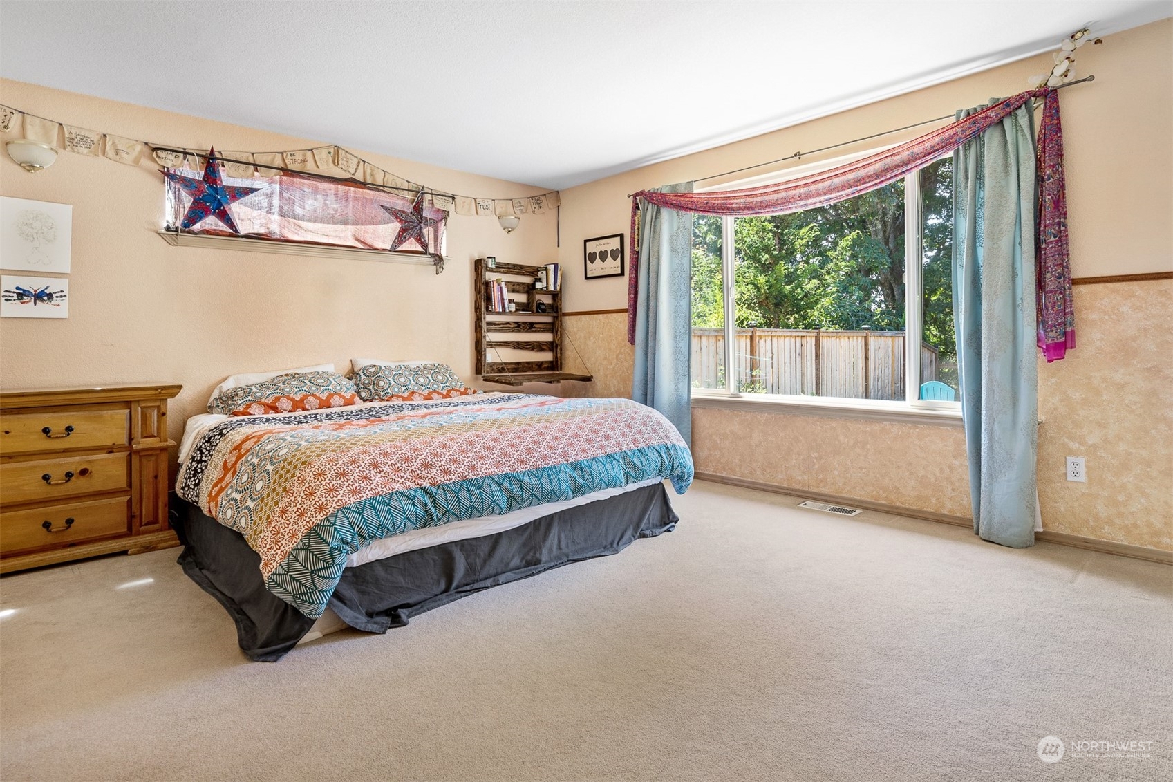 1765 53rd Loop Southeast Olympia, WA 98501 - Photo 20 of 34 a bedroom with a bed and a large window