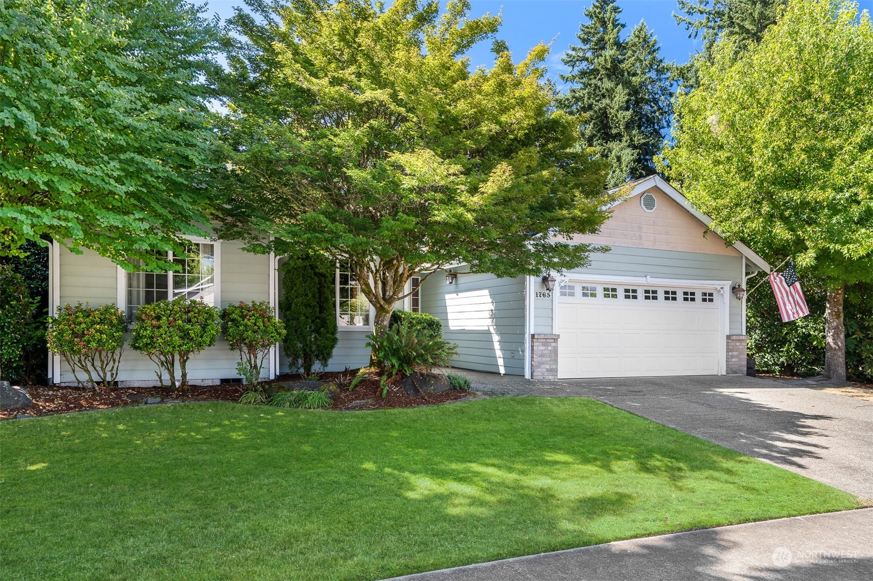 1765 53rd Loop Southeast Olympia, WA 98501 - Photo 2 of 34 a view of a house with a yard and a large tree