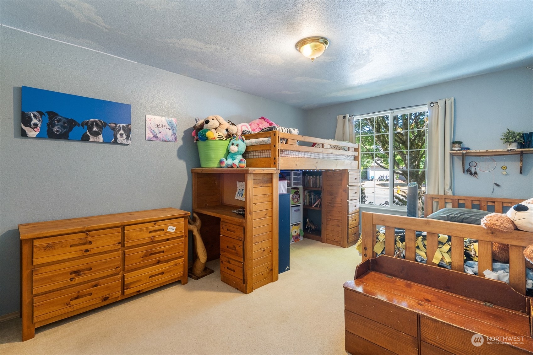 1765 53rd Loop Southeast Olympia, WA 98501 - Photo 24 of 34 a bed room with furniture and a window