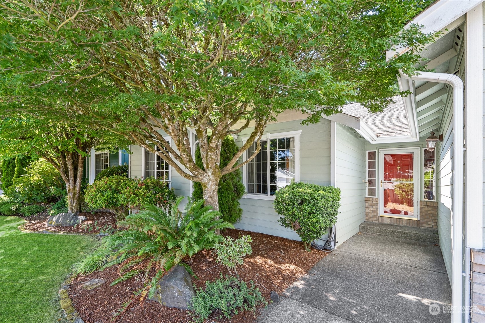 1765 53rd Loop Southeast Olympia, WA 98501 - Photo 29 of 34 a front view of a house with garden