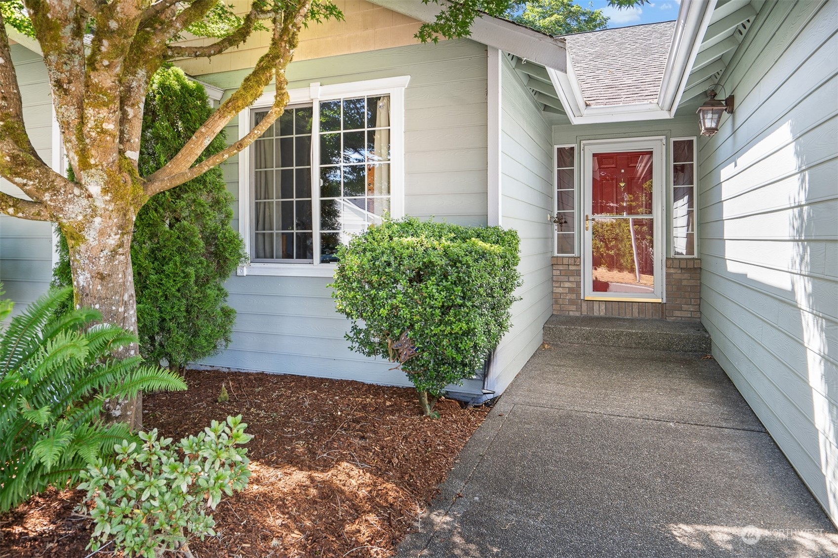 1765 53rd Loop Southeast Olympia, WA 98501 - Photo 3 of 34 a view of a pathway both side of house