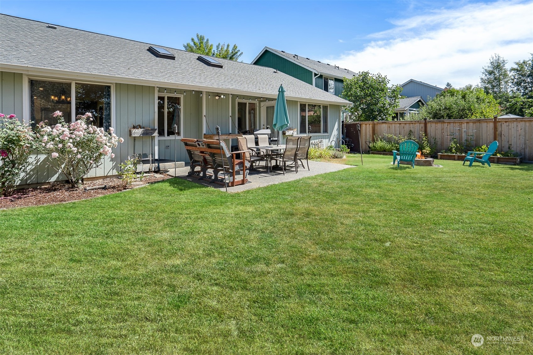 1765 53rd Loop Southeast Olympia, WA 98501 - Photo 31 of 34 a view of a house with backyard porch and sitting area