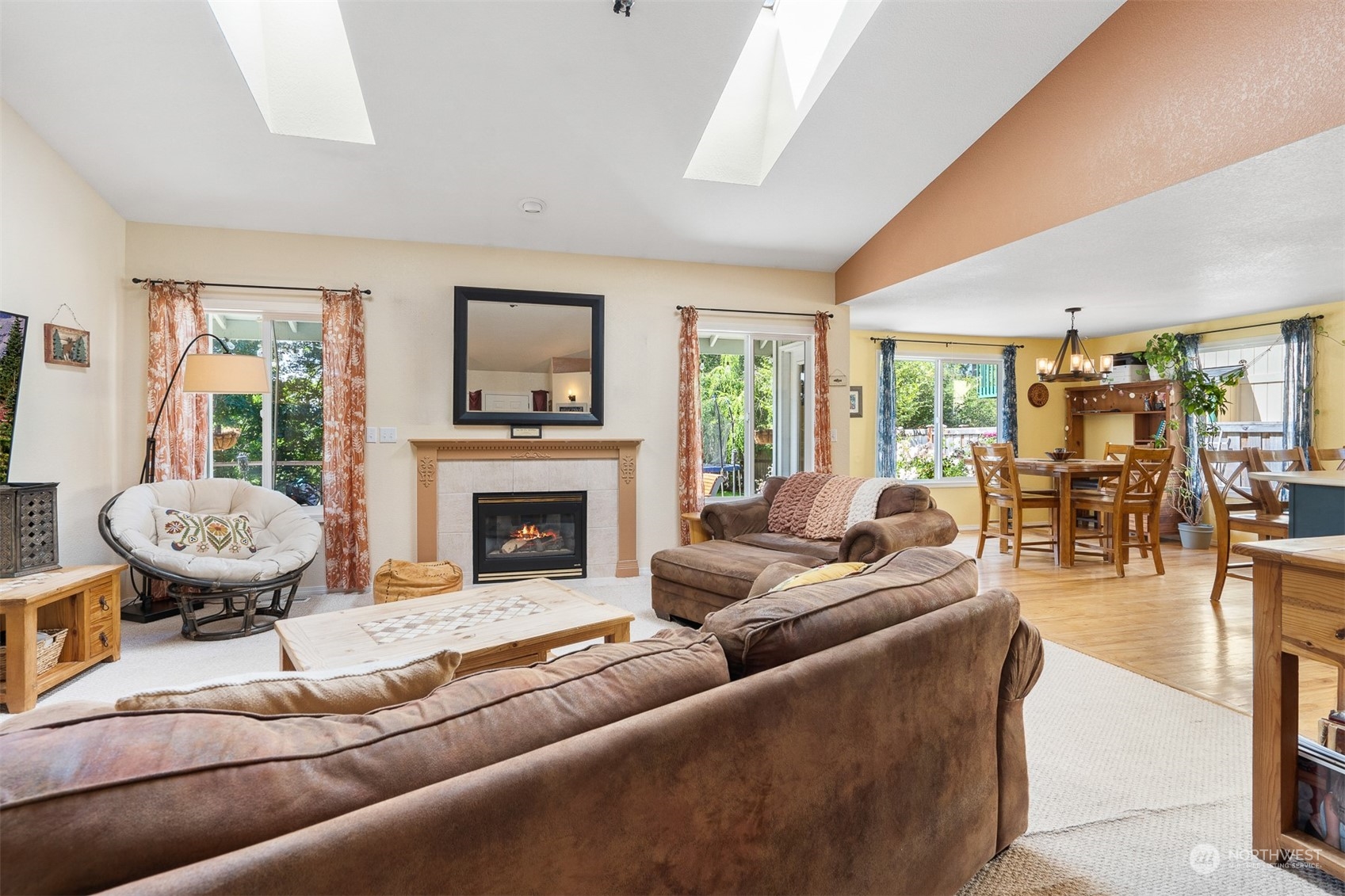 1765 53rd Loop Southeast Olympia, WA 98501 - Photo 8 of 34 a living room with furniture and a fireplace