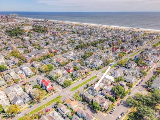 a stove top oven sitting inside of a kitchen
