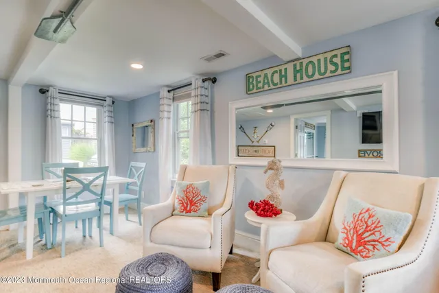 a living room with furniture and a table