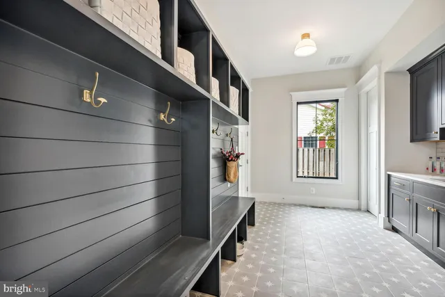 a view of an entryway and livingroom