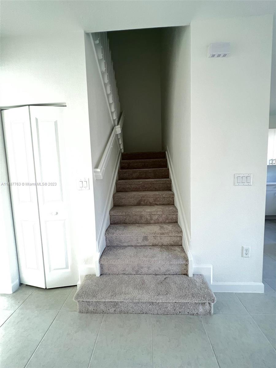 12765 Southwest 234th Terrace Homestead, FL 33032 - Photo 27 of 28 a view of staircase with white walls