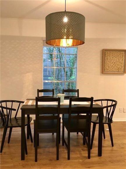 4600 Shoalwood Avenue Austin, TX 78756 - Photo 4 of 6 a view of a dining room with furniture and window
