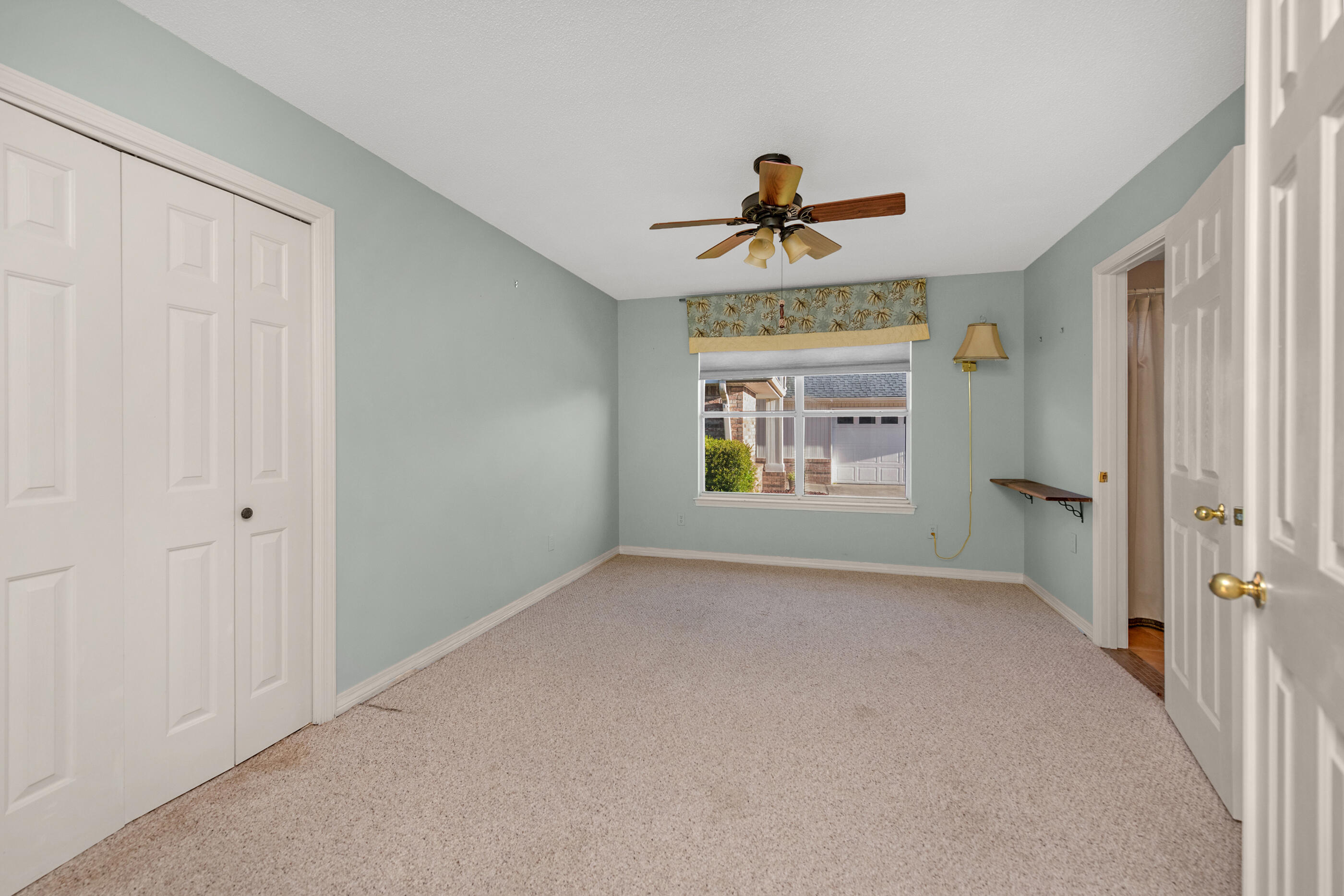 924 Shalimar Point Drive Shalimar, FL 32579 - Photo 25 of 40 a view of room with a ceiling fan and window