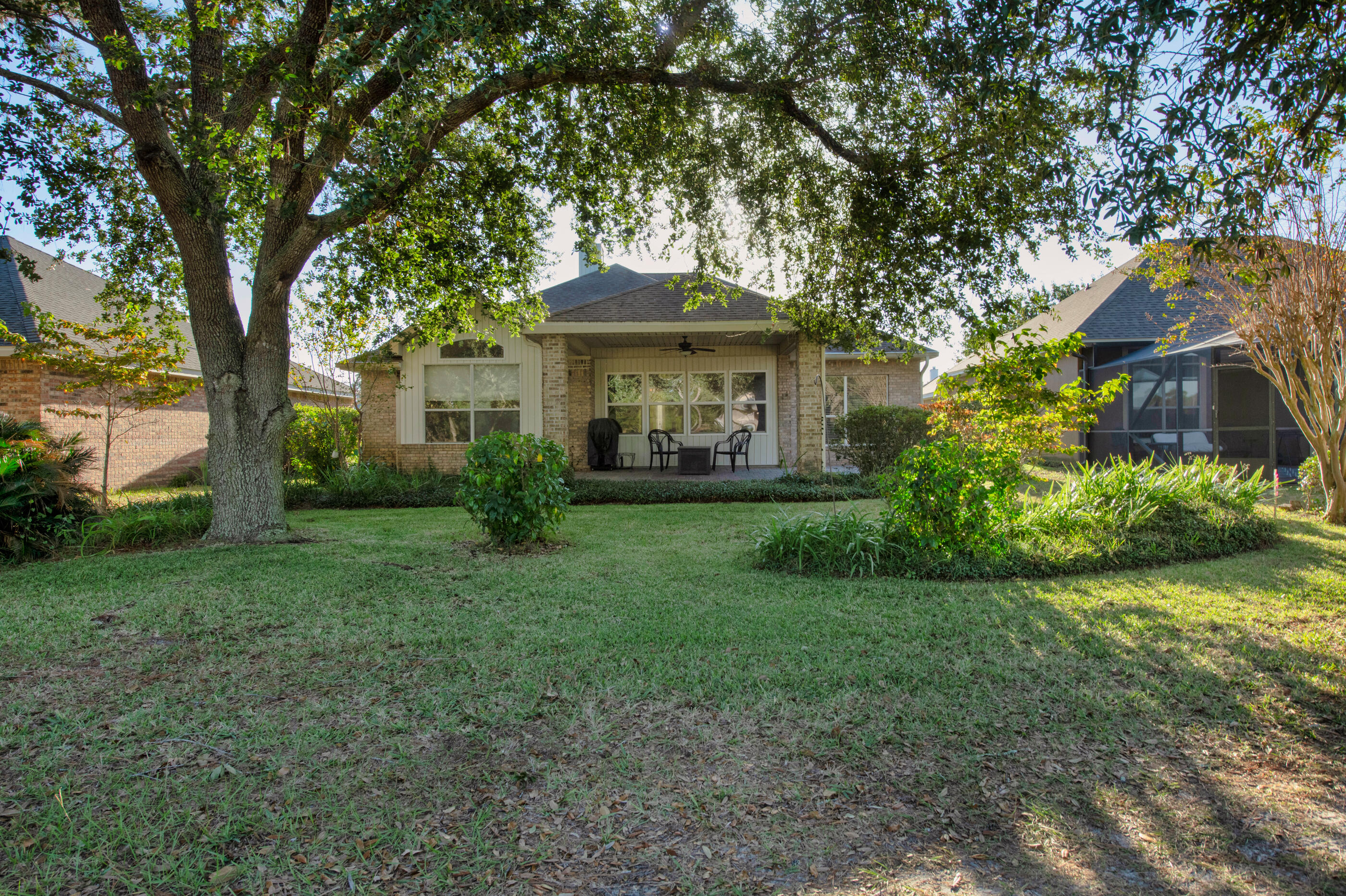 924 Shalimar Point Drive Shalimar, FL 32579 - Photo 36 of 40 a front view of a house with garden