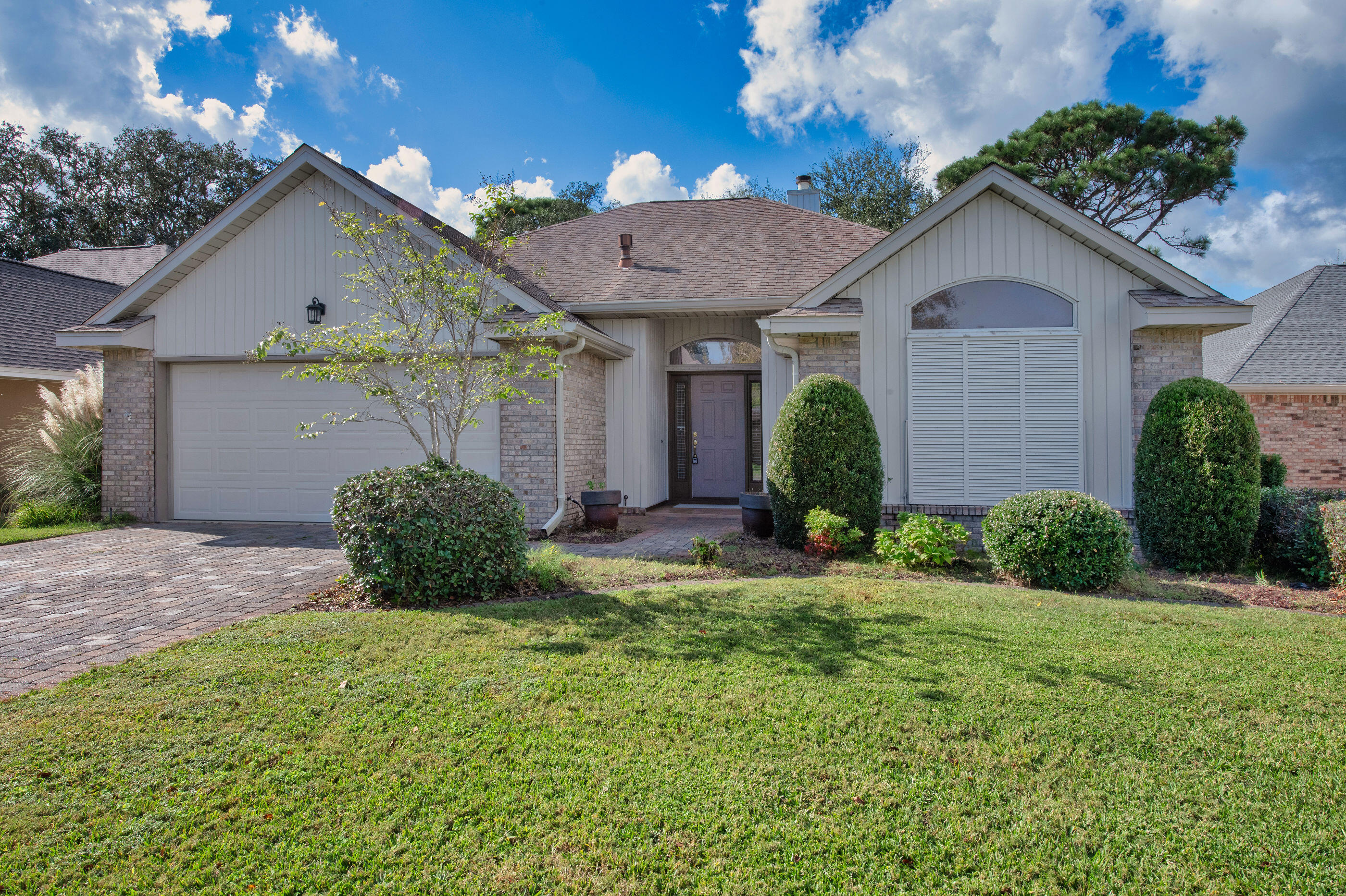 924 Shalimar Point Drive Shalimar, FL 32579 - Photo 40 of 40 a front view of a house with a yard and garage