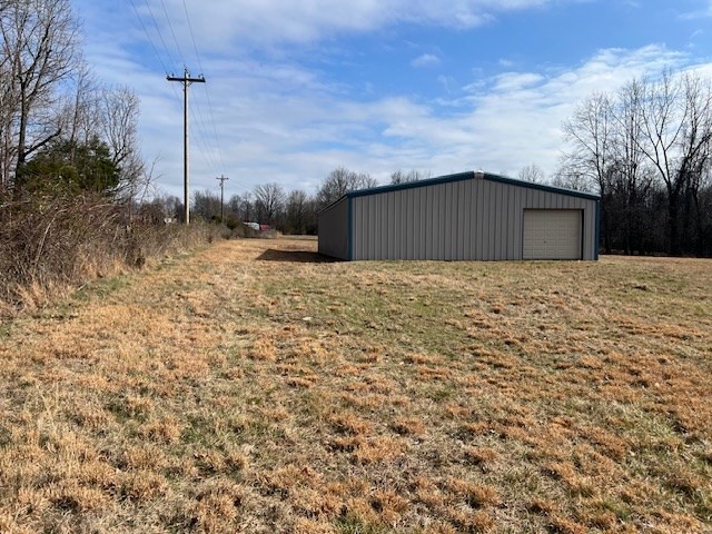2340 Turkey Town Road Hilham, TN 38568 - Photo 10 of 19 a backyard of a house with lots of green space